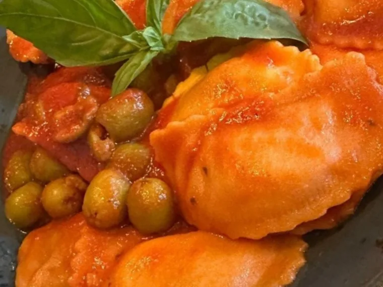 RAVIOLI DI BACCALA (cheese is not served with this dish)