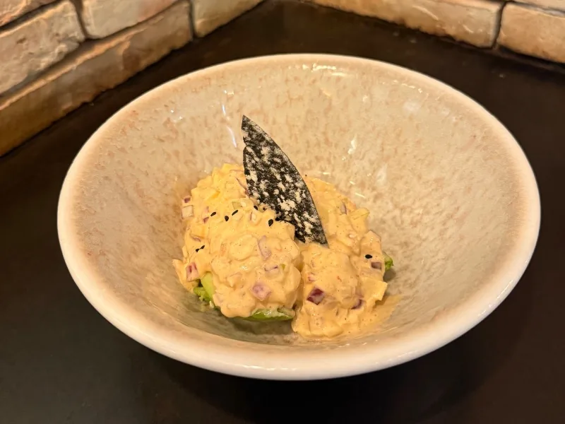 Stuffed avocado with shrimp, apple and kimchi farce