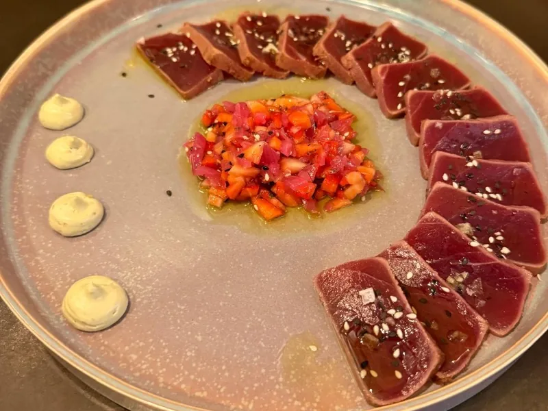 Tataki with blueberry and pickled onion salad with sesame oil